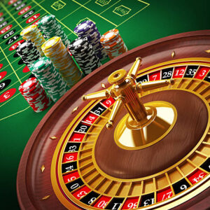 Roulette wheel and casino chips on the table.Similar images: